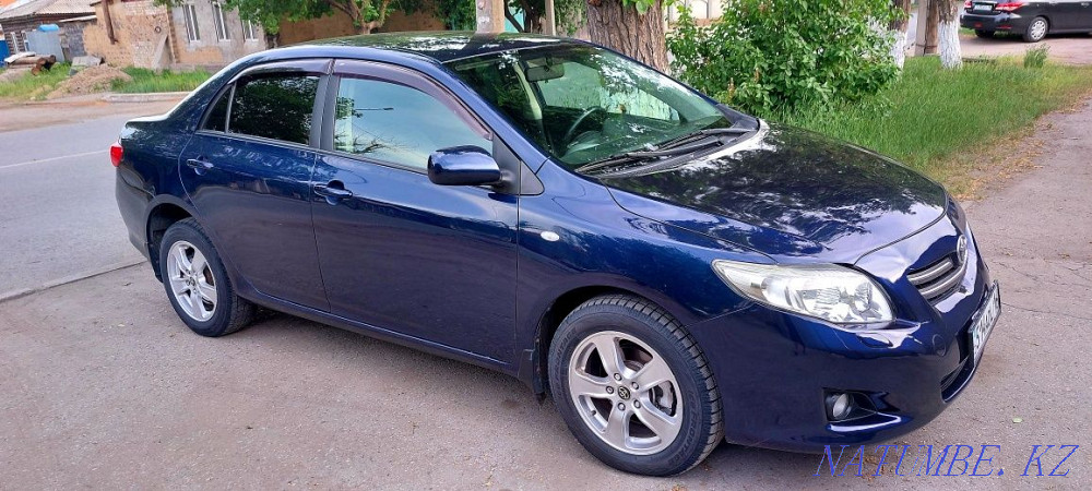 Жылдың Toyota Corolla  отбасы  - изображение 4