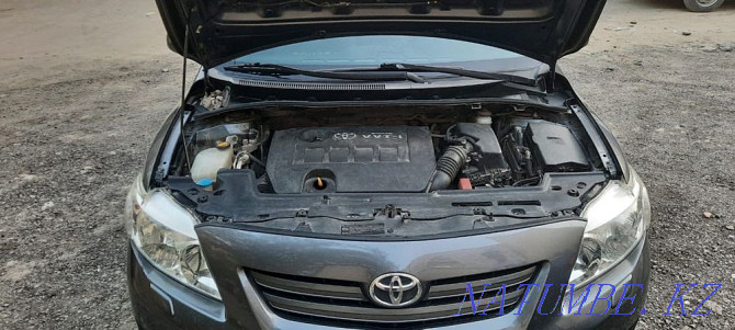 Жылдың Toyota Corolla  отбасы  - изображение 7