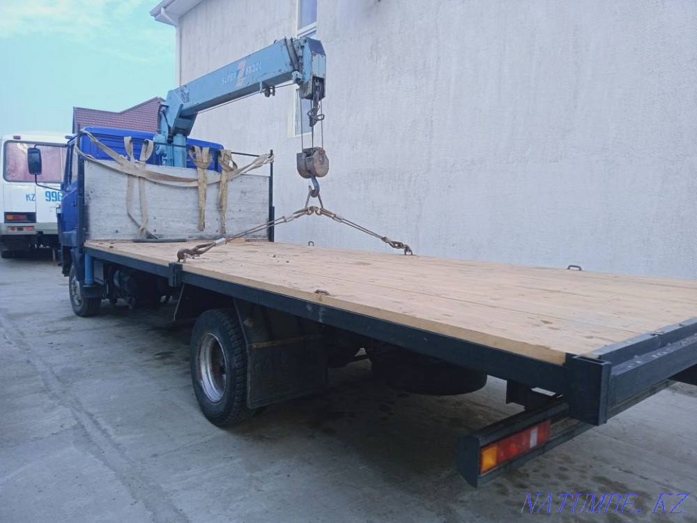 Манипулятор. по городу и район.тенгиз.ит.д Атырау - изображение 1