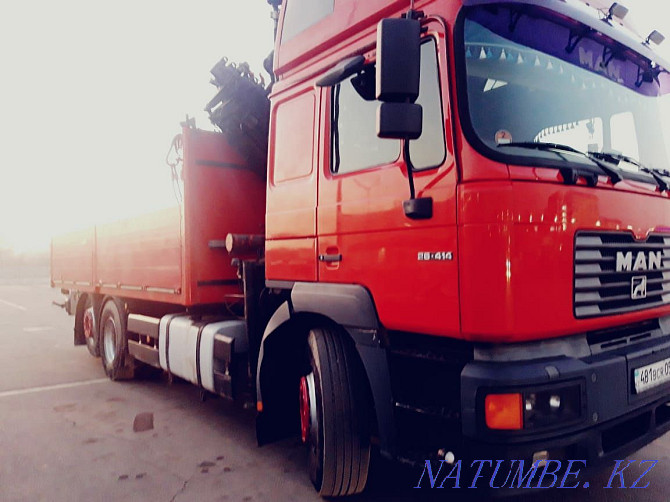 Services of the manipulator in Almaty 24/7 transportation of the container 20.ton Almaty - photo 1