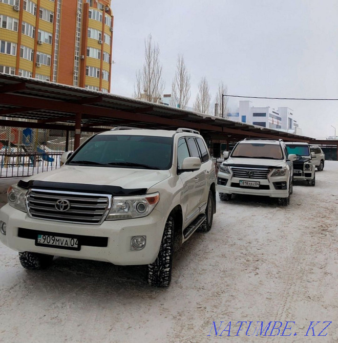 Rent a Car Rent Passenger transportation VIP Taxi Prado Kruzak 200 Aqtobe - photo 2