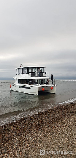 Boat trip on a big catamaran Vladivostok - photo 1