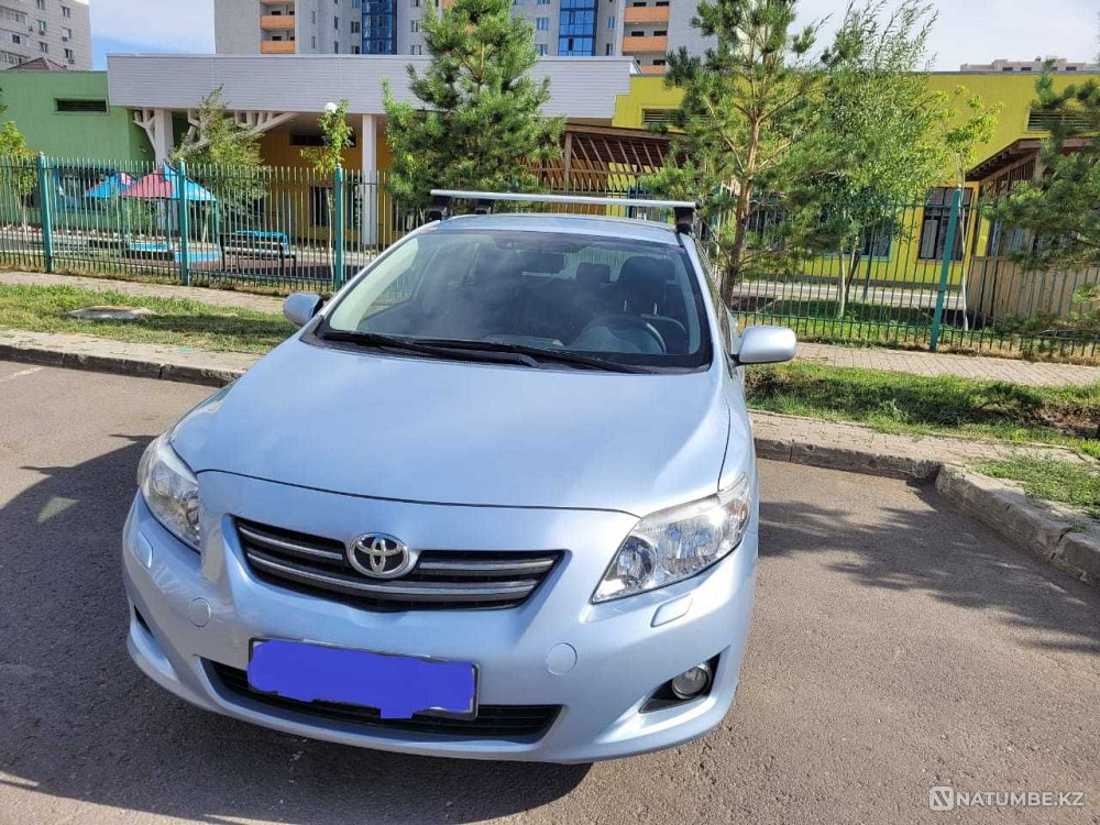 Синяя Corolla е150