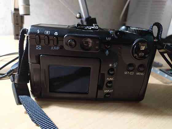 Фотоаппарат Canon в комплекте со штативом Алматы