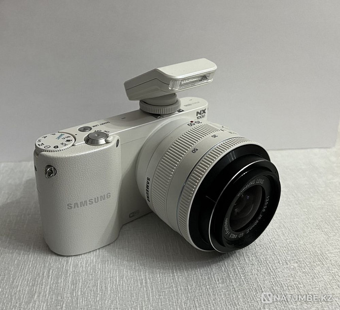 Samsung NX1000..  - photo 1