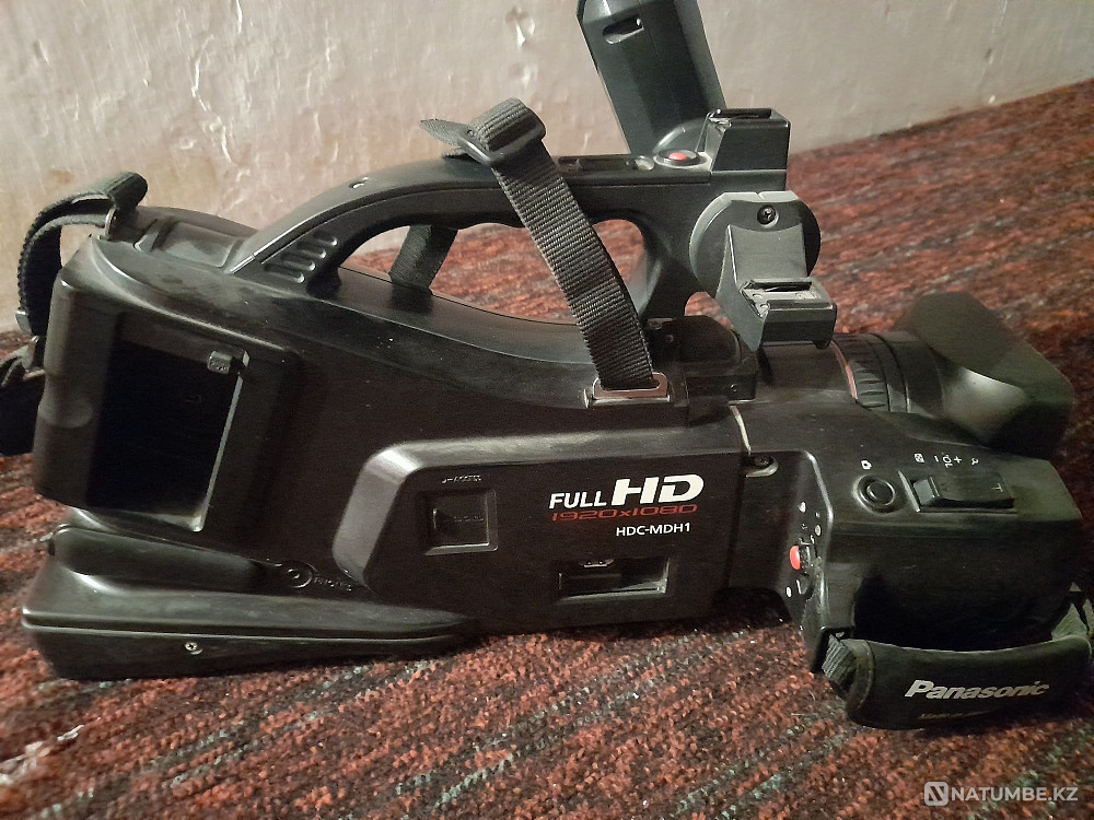 Продам видеокамеру Panasonic HDC-MDH1 СРОЧНО  - изображение 4
