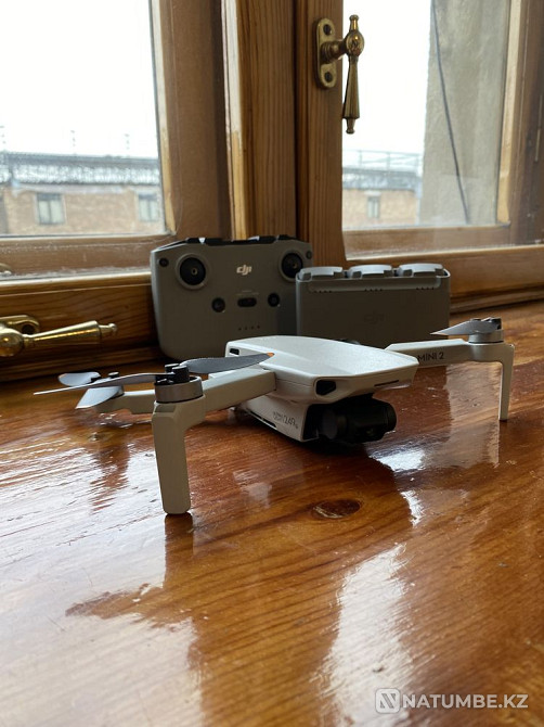 DJI MINI 2 Fly More Combo  - photo 1