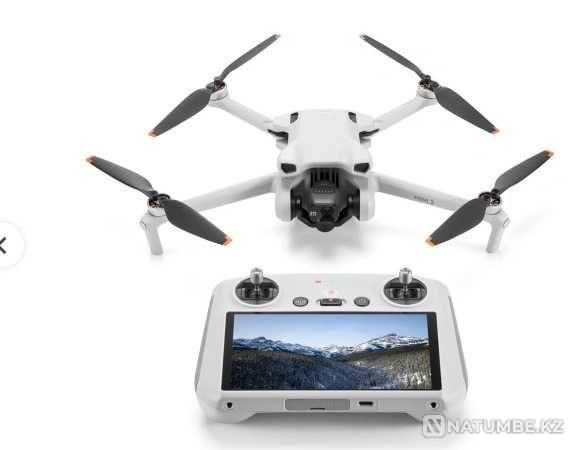 DJI Mini 3 Fly More Combo (DJI RC) Quadcopter  - photo 1