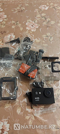 Selling action camera in perfect condition with  - photo 2