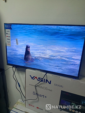 Smart TV; екі қашықтан басқару құралы қосылған. Үшарал - изображение 5