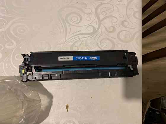 Картридж оригинал на HP CB541A cyan синий Алматы
