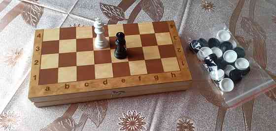Продам- новые Шахматы с шашками .  Алматы