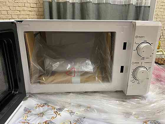 Продам микроволновую печь  Алматы