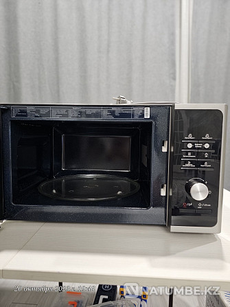 Selling a used Samsung microwave Almaty - photo 2